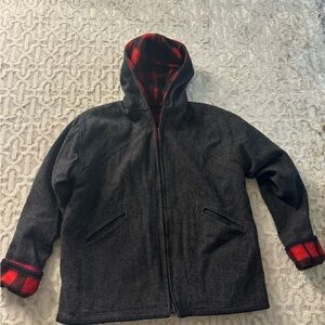 Vintage homemade wool and flannel men’s coat fits like a size large.